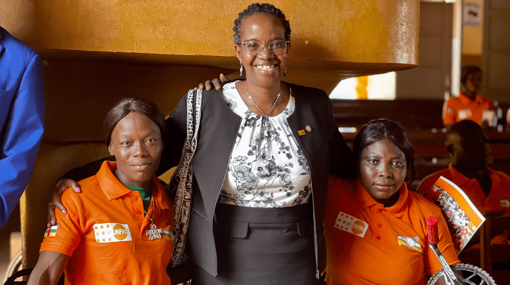 La représentante ai. de l'UNFPA RCA, Dr Agnes KAYITANKORE et deux femmes vivant avec un handicap moteur